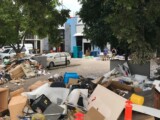 The rubbish pile on the footpath of Douglas Street, looking towards the VRT office. (Credit: Ryan Monaghan)