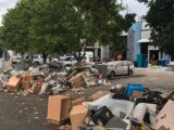The rubbish pile on the footpath of Douglas Street, looking a little more up the street towards Park Road. (Credit: Ryan Monaghan)